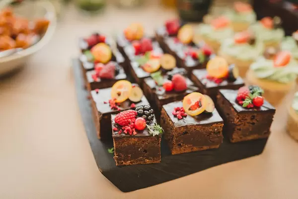 Delicious Sweet Brownie Squares With Various Berries On Top (Flip 2019)
