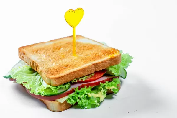 Delicious toast on a white background. The concept of fast food