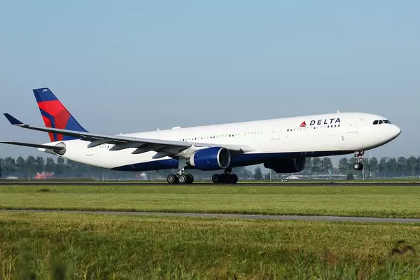 Delta airplane taking off from Polderbaan, Amsterdam Airport, AMS
