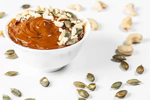 Dessert with condensed milk, cashew nuts and pumpkin seeds (Flip 2019)