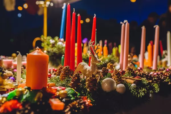 Detail Of Christmas Wreath With Red Candles And Pines