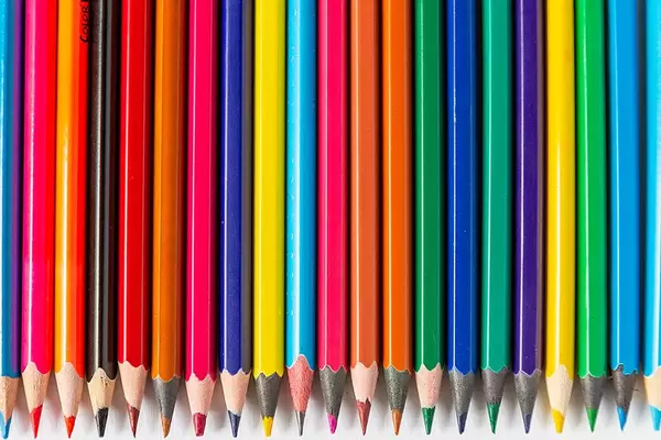 Detailed view of colored pencils in a row