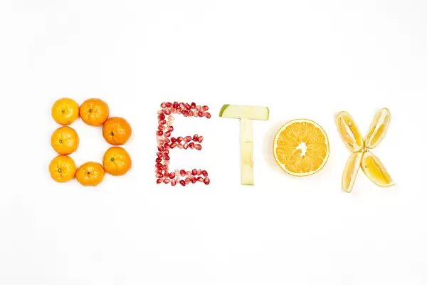 Detox word made with organic fruits