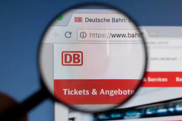 Deutsche Bahn logo on a computer screen with a magnifying glass