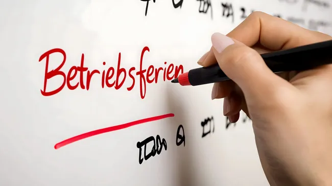Deutschsprachiges Whiteboard mit Geschäftsbezeichnung