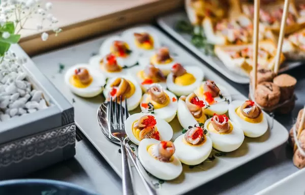 Deviled Eggs With Herring And Caviar