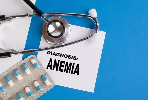 Diagnosis Anemia written on medical blue folder