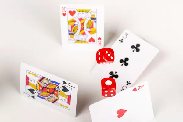 Dice and cards are flying, poker game concept