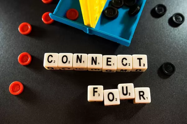 Dice reading CONNECT FOUR