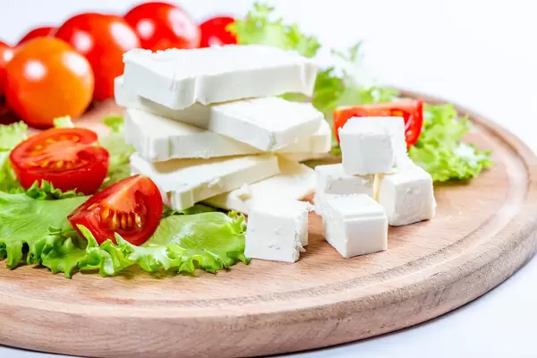 Diced feta cheese with tomatoes and lettuce  Flip 2019