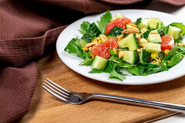 Diet salad with vegetables, grapefruit and nuts (Flip 2019)