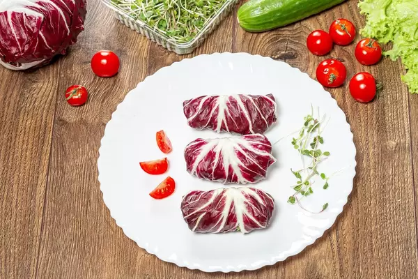 Dietary stuffed salad chicory Radicchio with vegetables and micro greenery (Flip 2019)