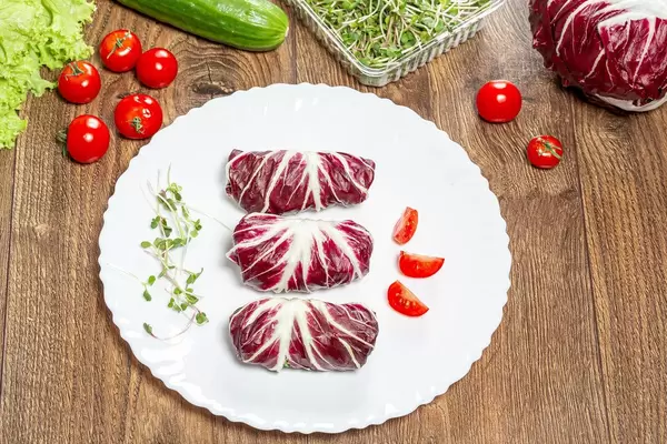 Dietary stuffed salad chicory Radicchio with vegetables and micro greenery