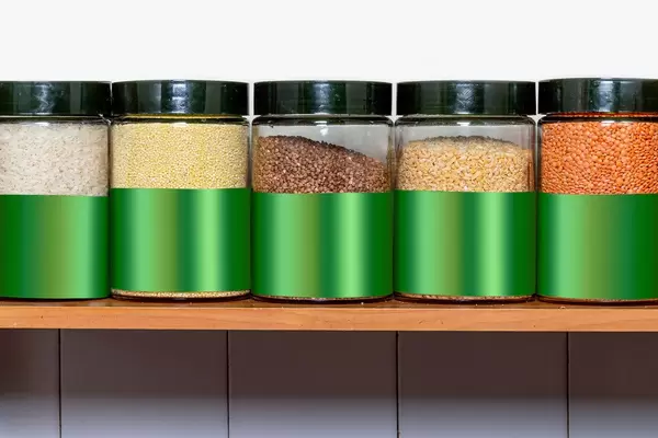 Different groats in glass jars on the shelf (Flip 2020)