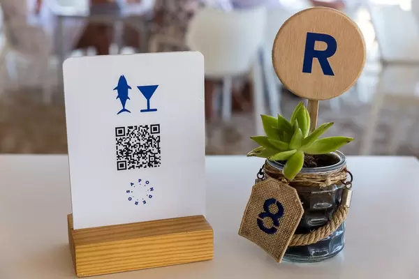 Digital menu for smartphones with QR-code at Mallorca restaurant during the coronavirus pandemic
