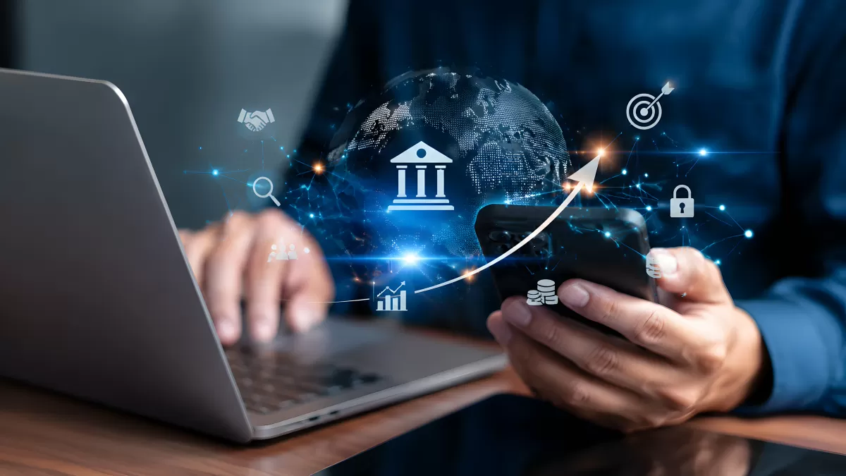 Digitales Banking mit Smartphone und Laptop weltweit