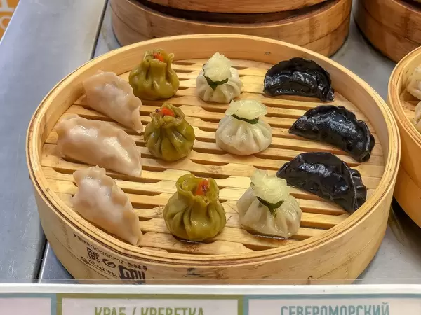 Dim sum with halibut, squid and shrimp, mussels and shrimp and gedze with chicken