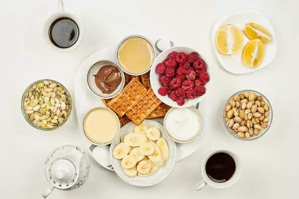 Directly above shot of breakfast on white background