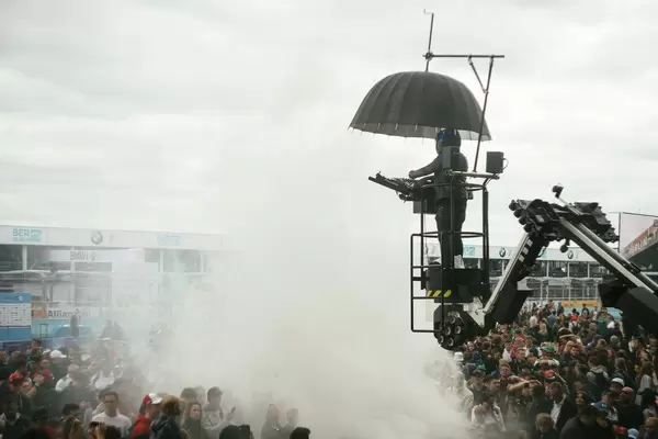 DJ making music after the race raised above the crowd