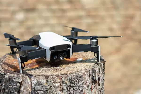 DJI Mavic Air drone parked on the tree stump (Flip 2019)