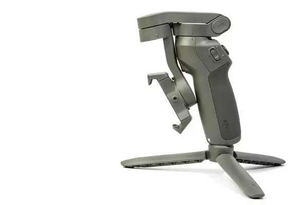 DJI Osmo Mobile 3 phone gimbal above white background