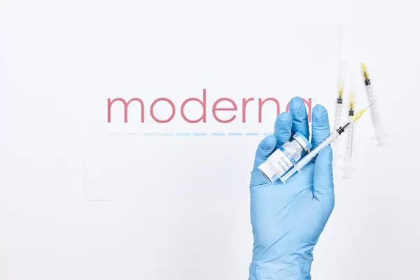 Doctor holds an injection with new Moderna vaccine