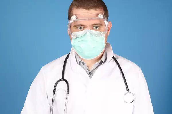 Doctor on blue background