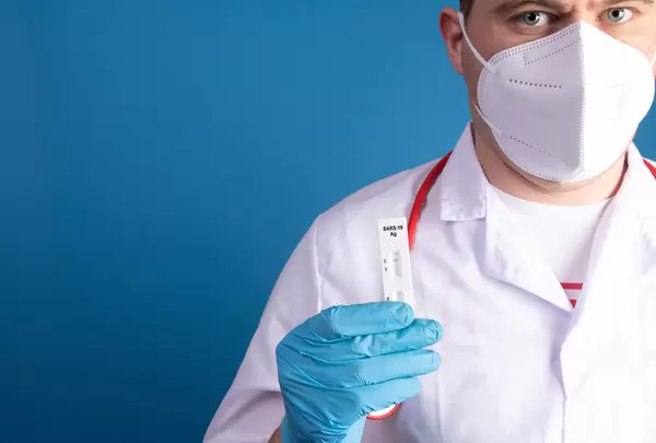 Doctor with Coronavirus antigen test