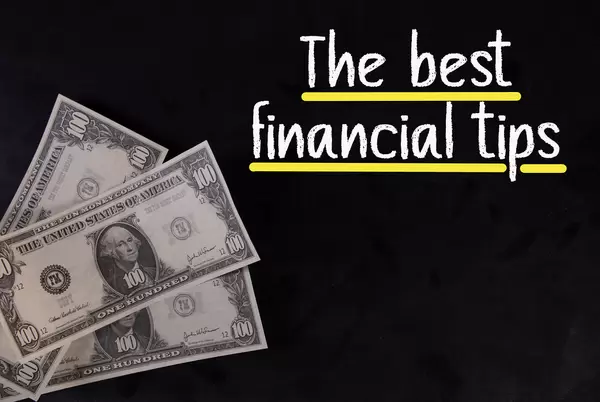 Dollar banknotes and The best financial tips text