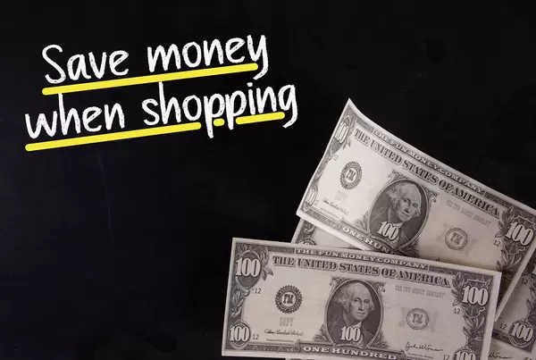 Dollar banknotes with Save money when shopping text