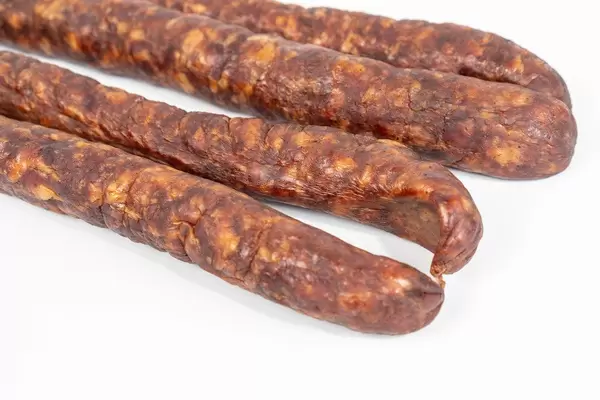 Domestic Homemade pork meat Sausages above white background (Flip 2019)