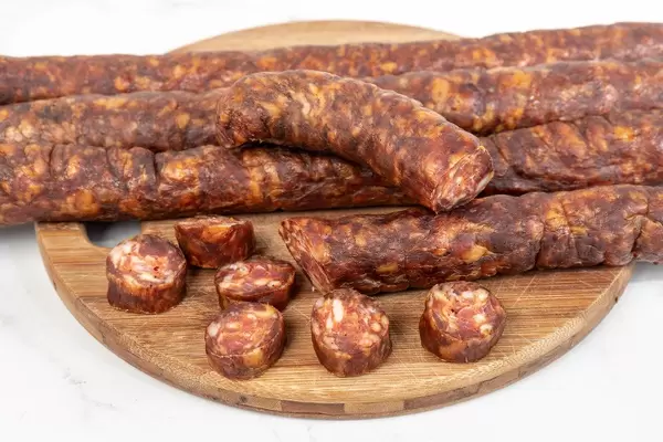 Domestic Homemade pork meat Sausages on the cutting board (Flip 2019)