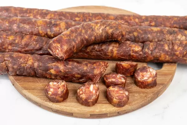 Domestic Homemade pork meat Sausages on the cutting board