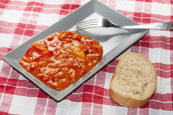 Domestic vegetable stew served on the plate with bread