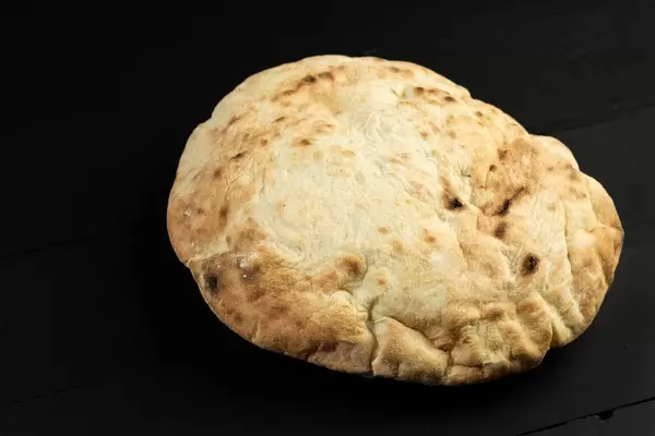 Domestic White Bread above black table