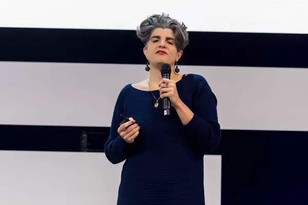 Dr. Shermine Voshmgir, director Cryptoeconomics Research Lab on stage at Digital X in Cologne