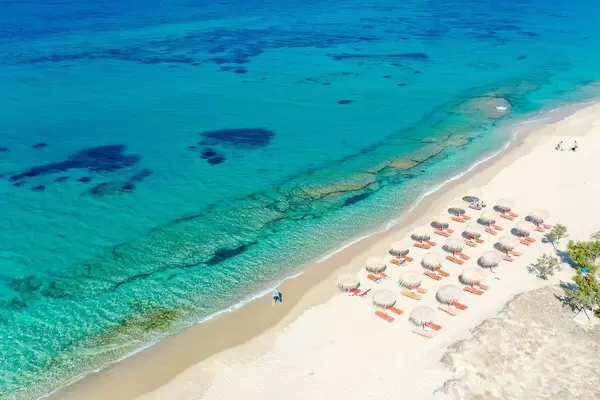 Dream holiday destination: the sandy beach of Plaka on the island of Naxos with blue sea and no crowds
