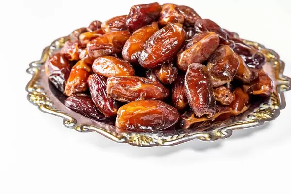 Dried dates on a silver tray