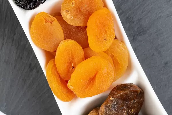 Dried Peaches served on the plate (Flip 2019)