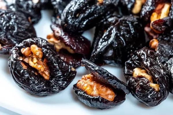Dried prunes stuffed with walnuts