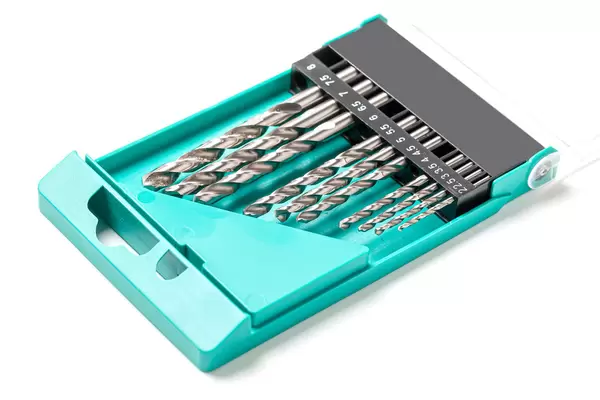 Drill bit set in box on white background