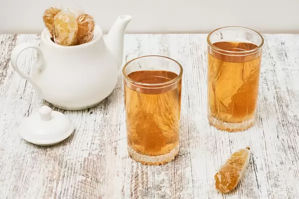 Drinking tea with sweet candies