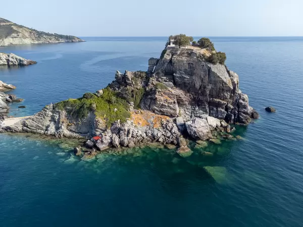 Drone image of Mamma Mia! movie filming location: Sophie's wedding at Agios Ioannis, Skopelos, Greece