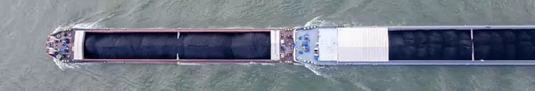 Drone Shot: Coal Ship on Rhine River