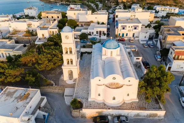 Drone shot of an icon of Milos: the church of Agios Charalambos with the typical Greek blue dome