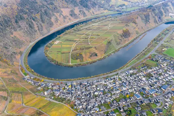 Drone Shot of Moselle Valley with Historical Landmark Kloster Ruine Stuben, Moselschleife, Hill Calmont and Municipality Bremm in Germany
