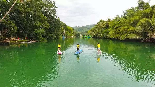 Drone shot of people kayaking in a river in Palawan Island  (Flip 2019)