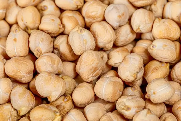Dry raw chickpeas background. Top view (Flip 2019)
