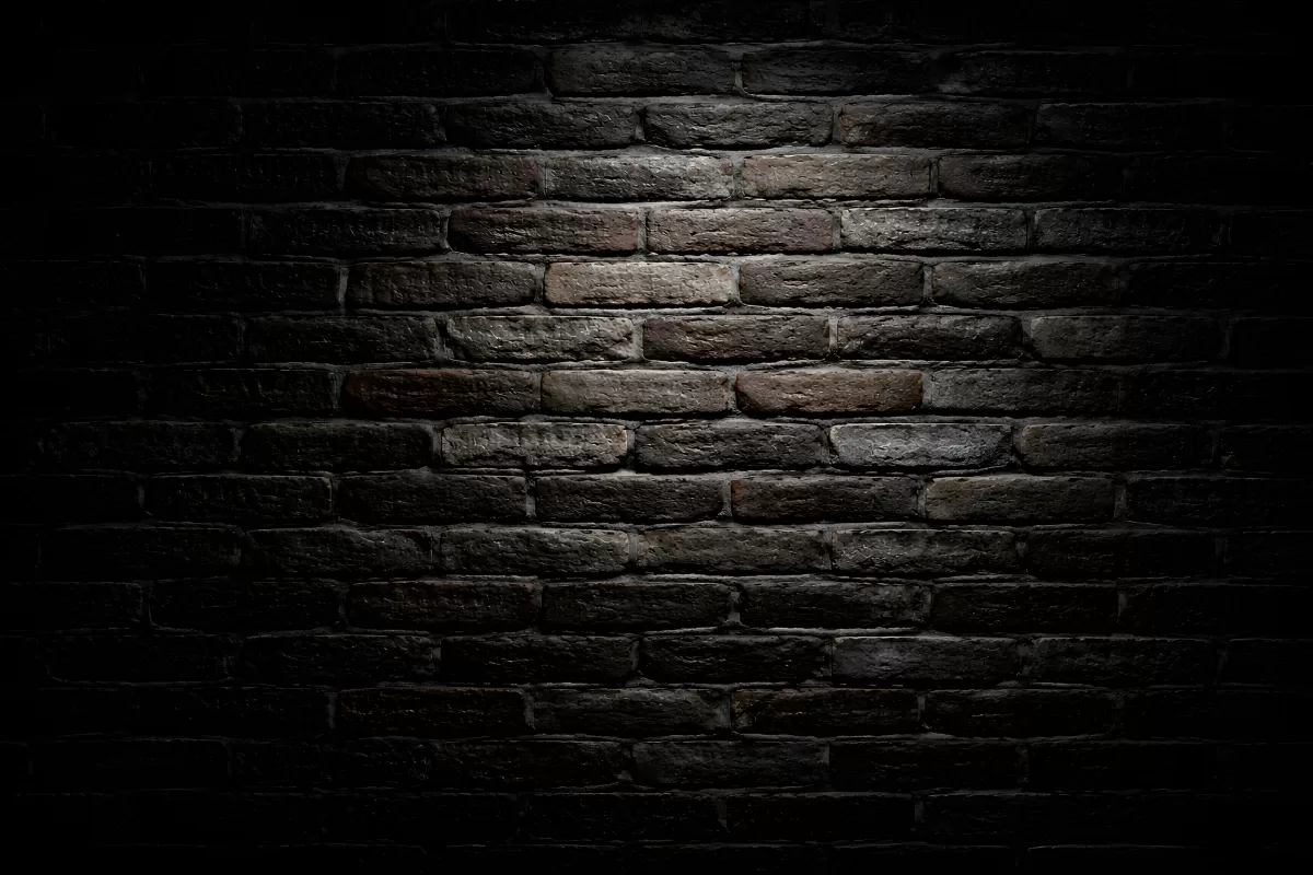 Dunkle und raue Steinmauer als Hintergrund