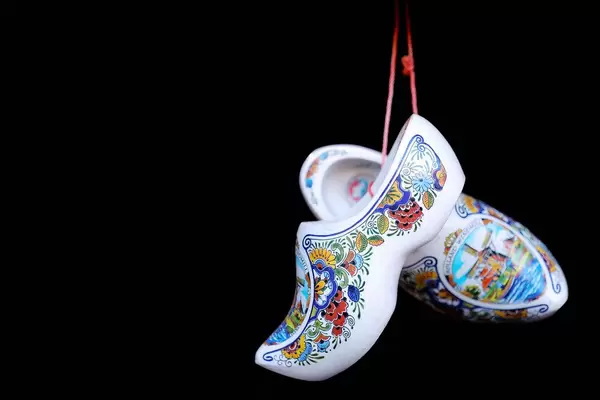 Dutch clogs souvenir, black background